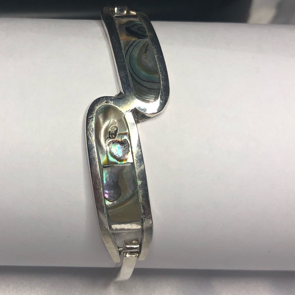 Silver and abalone bracelet.